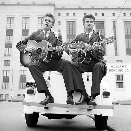 Everly Brothers on a Scooter Tricycle, 1957