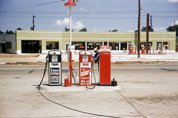 Pumps at the ESSO station owned by Jack Robinson's father, Mid-1960s